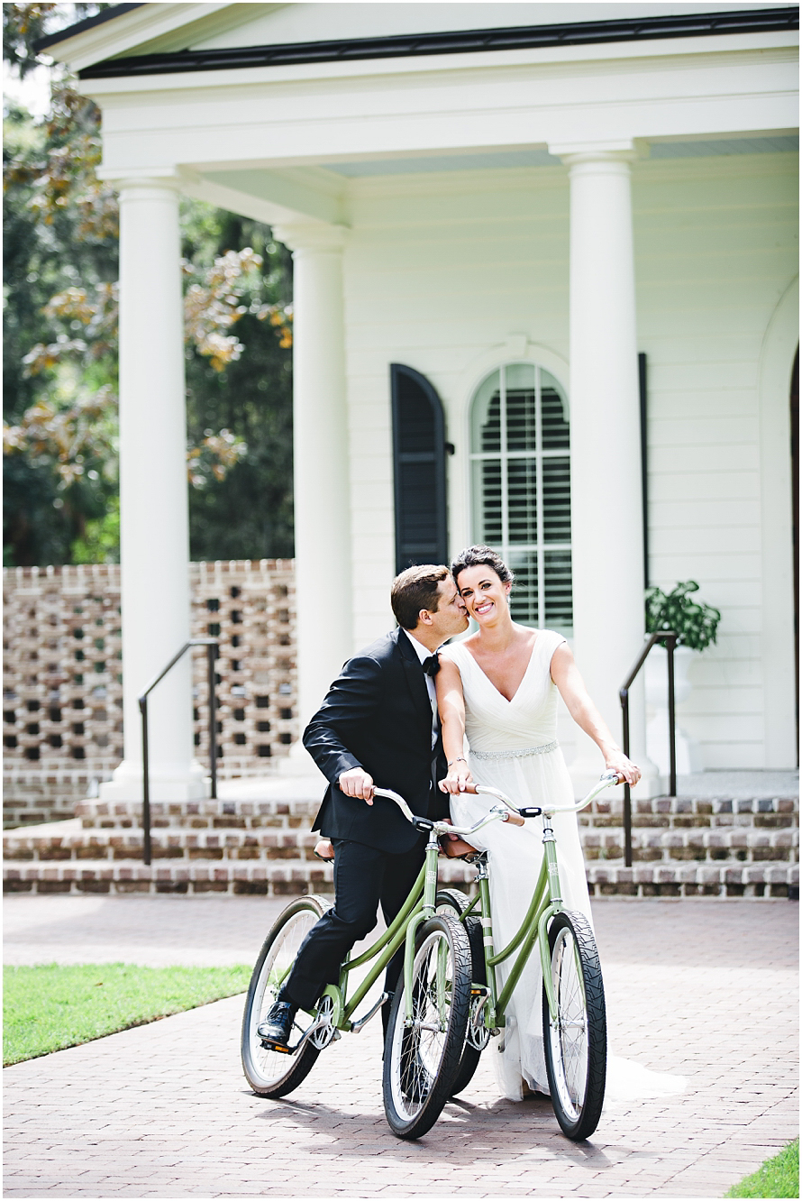 palmetto bluff wedding - bride and groom on bikes - sea island wedding photographer