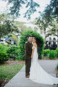 Bride and groom portraits in front of the Jepson Museum in Savannah, Georgia