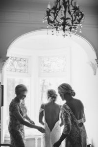 Getting ready boudoir portraits on your wedding day by Izzy And Co.