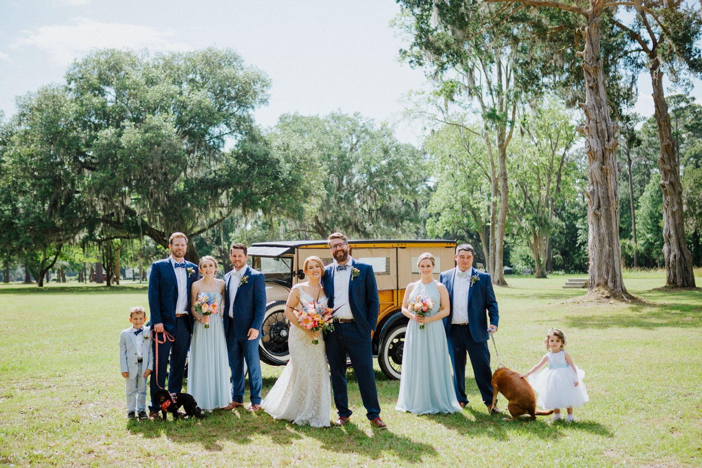 Dusty blue bridesmaids at a spring Kentucky Derby Inspired Wedding - Izzy and Co. Photography