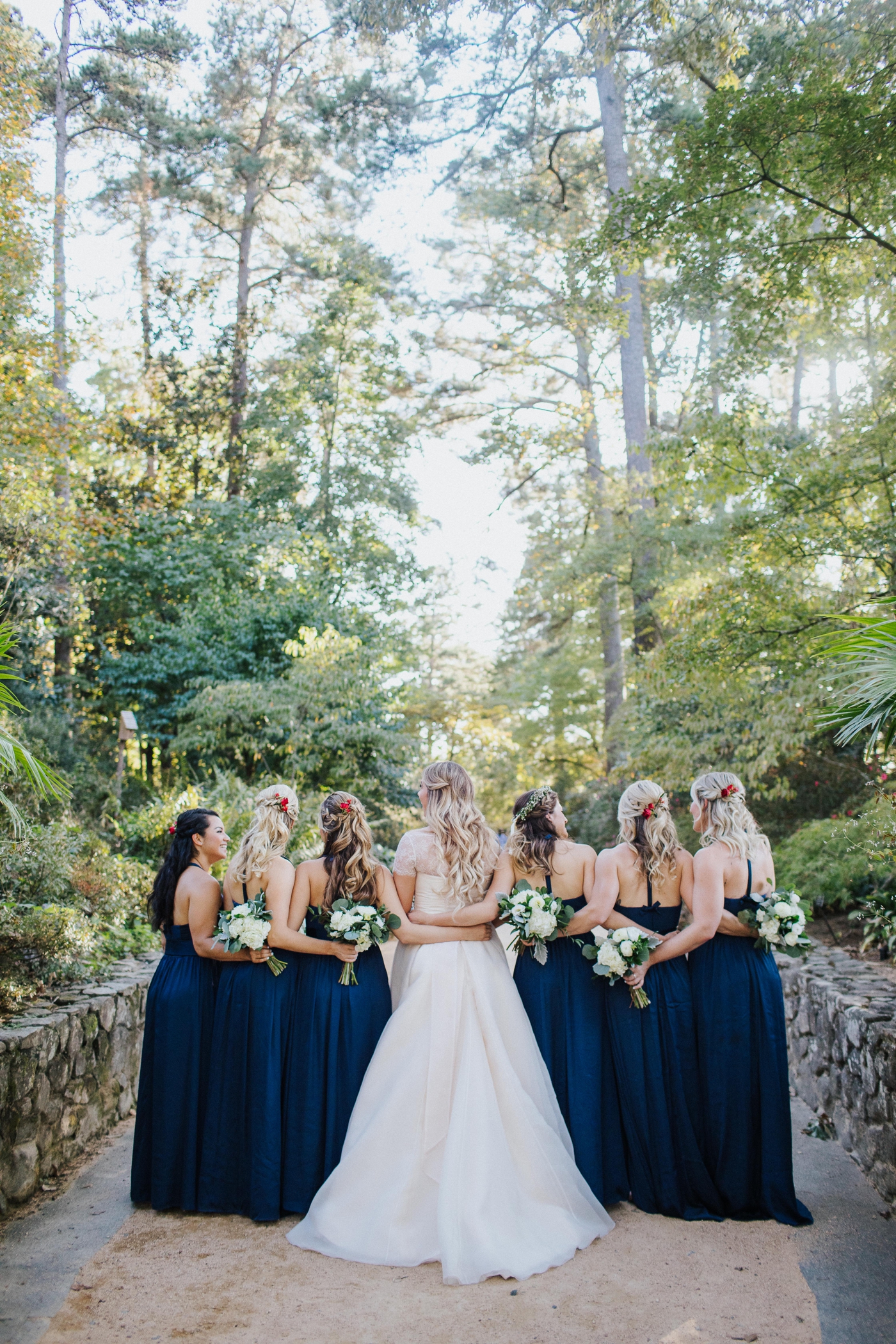 Navy blue bridesmaids gowns from David’s Bridal