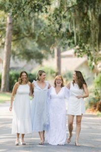 Blue, white, and khaki outfits for an outdoor family session