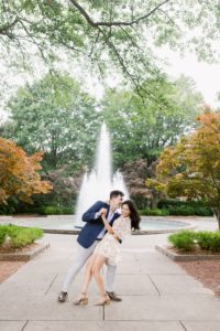 engagement session in front of a fountain