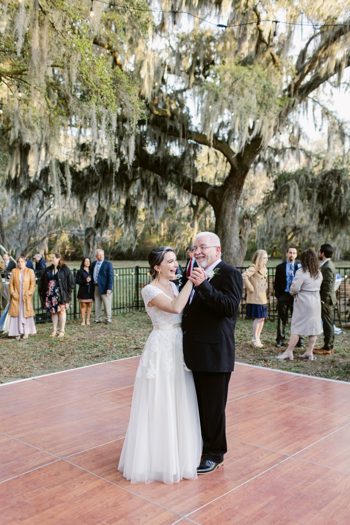 father daughter dance at outdoor wedding