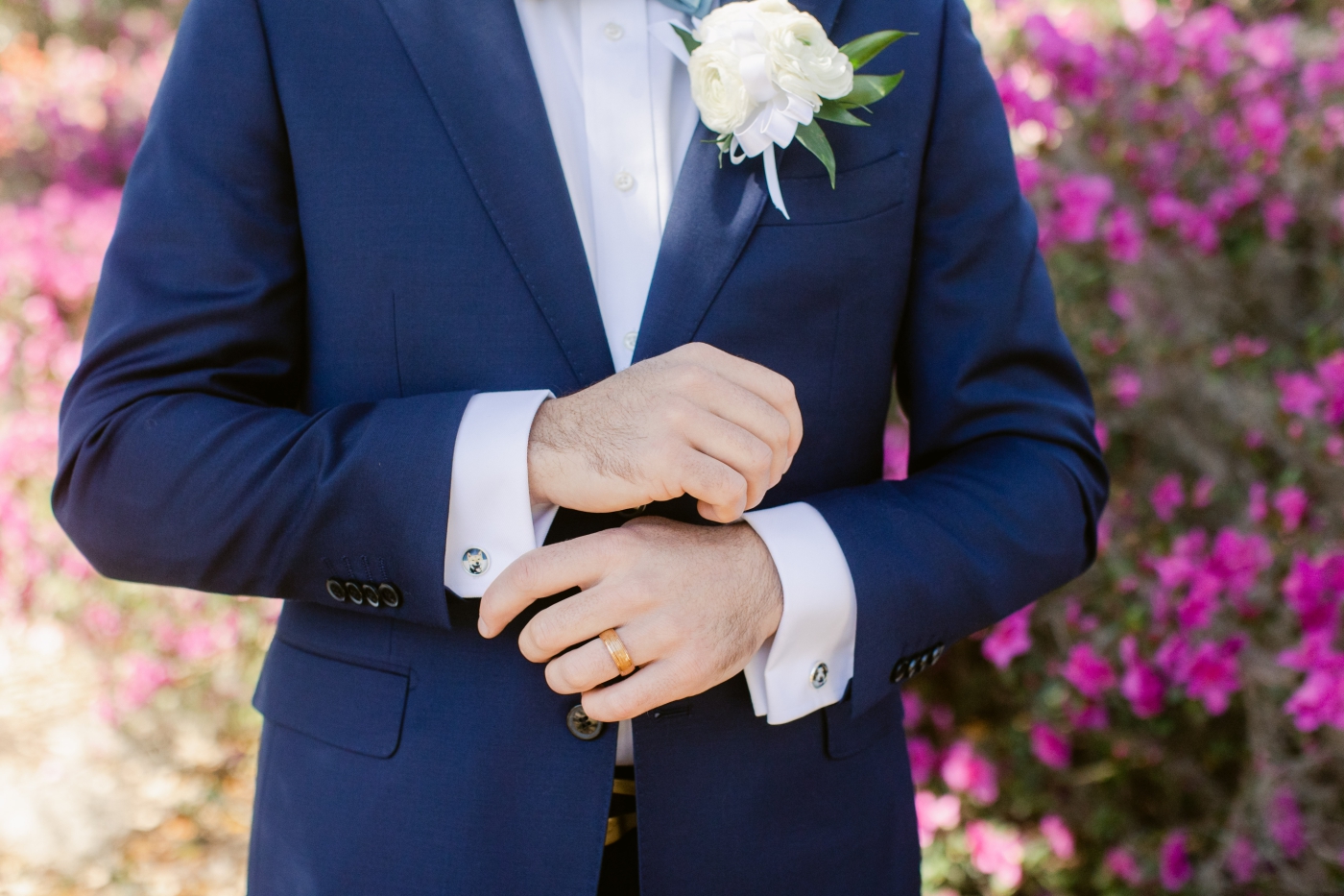 groom in navy blue suit