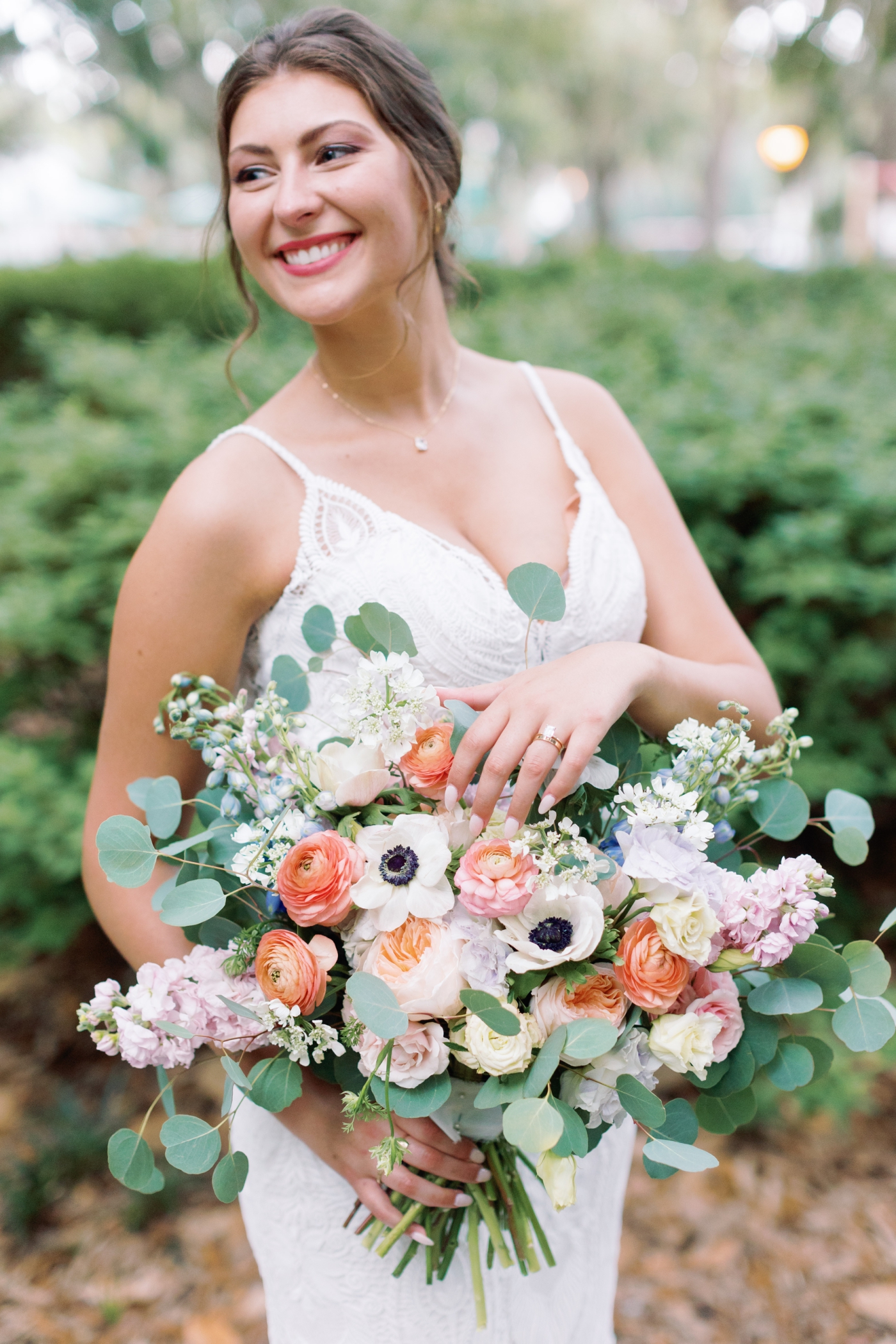 large bridal bouquet with ranunculus and anemones 