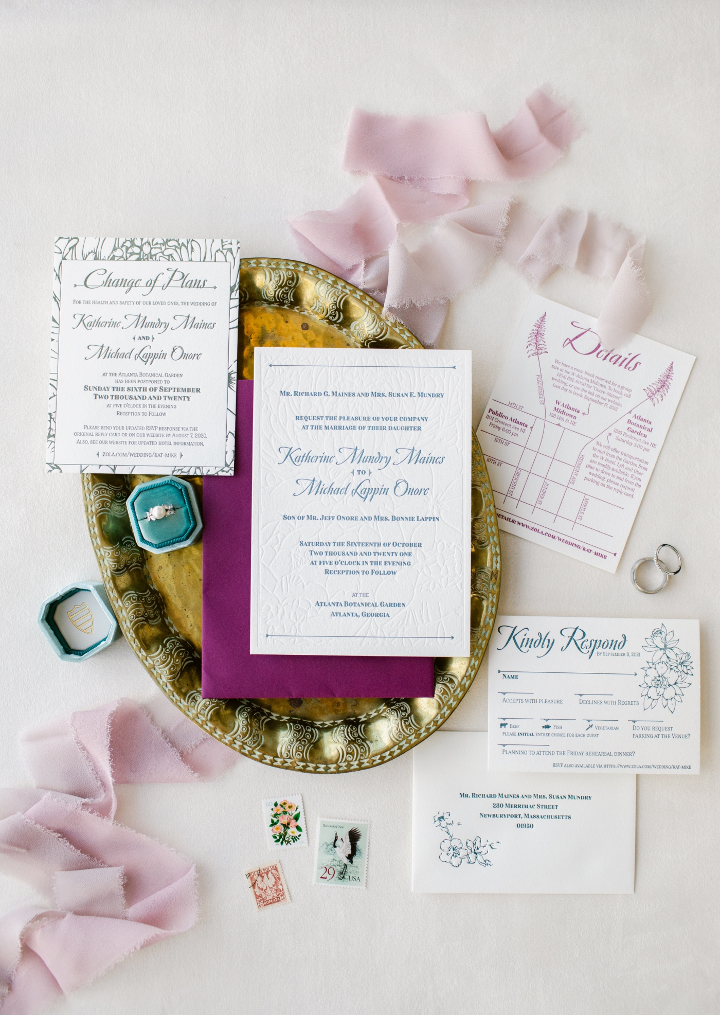 blue and pink wedding invitation flatlay