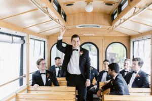 Groom and groomsmen in a trolley from Old Savannah Tours