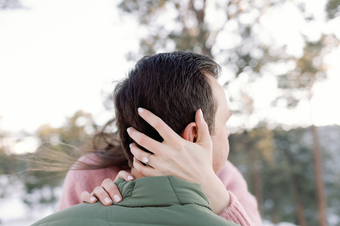 Couple embracing at their engagement session