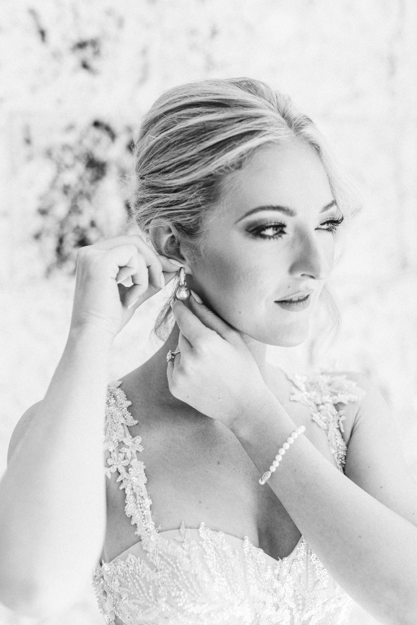 bride with pearl accessories