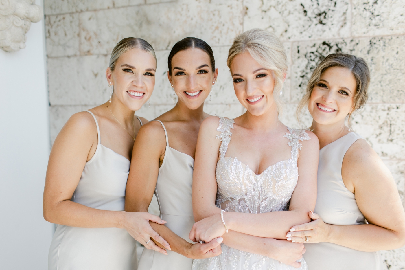 bridesmaids in cream dresses