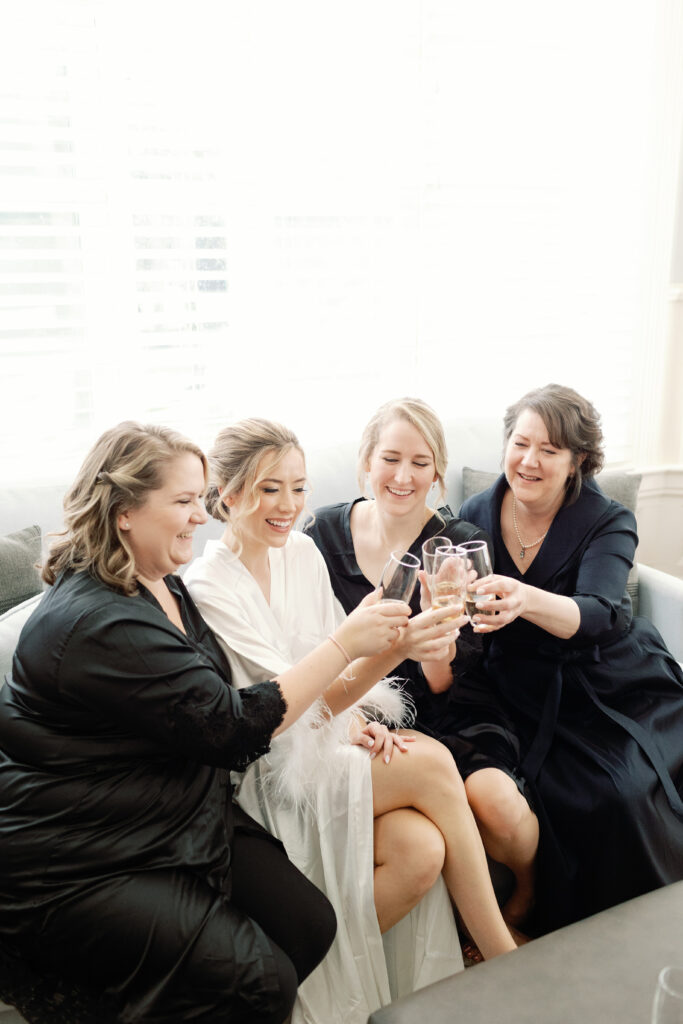 A bride to be cheersing her family.