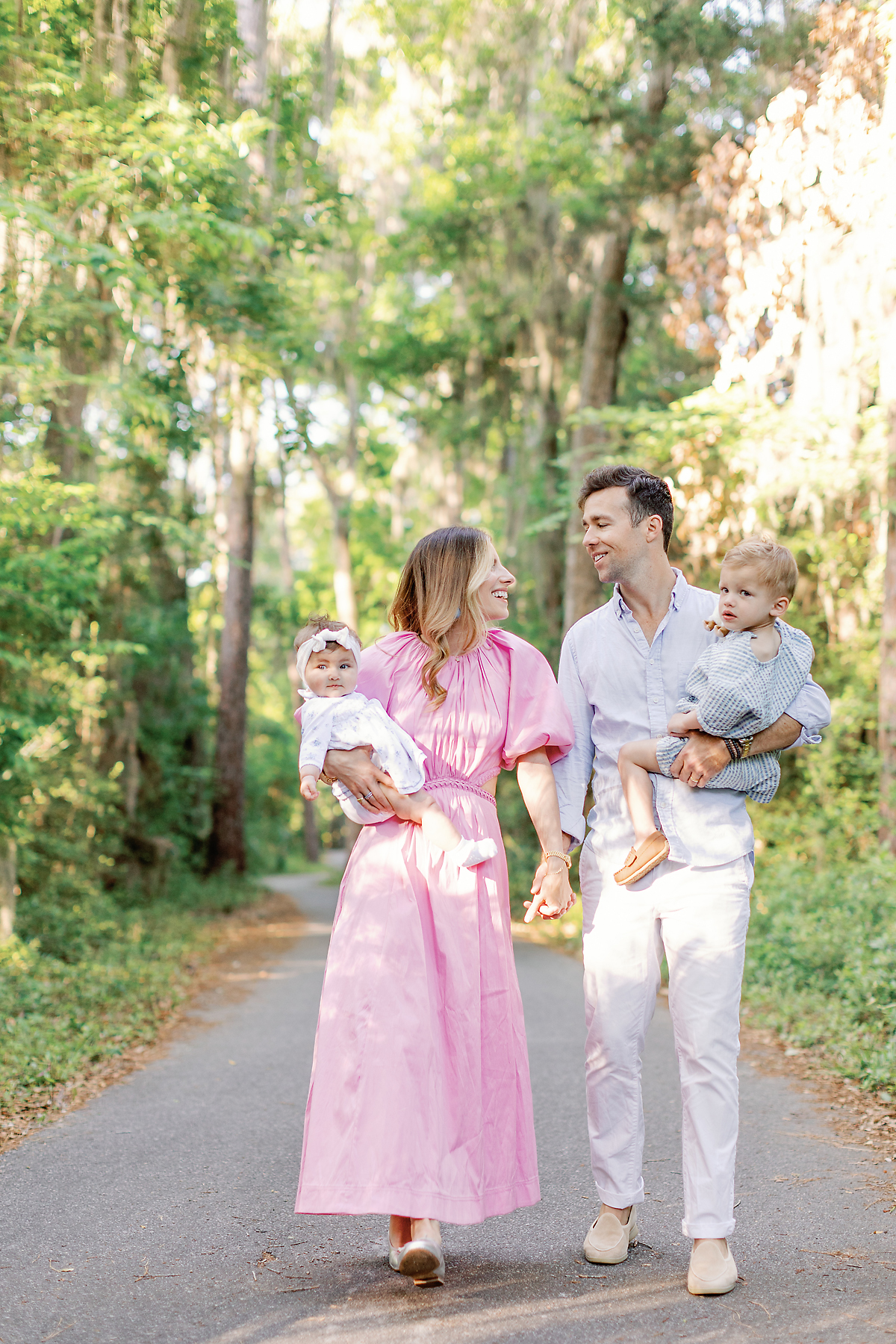 family smiling and walking together