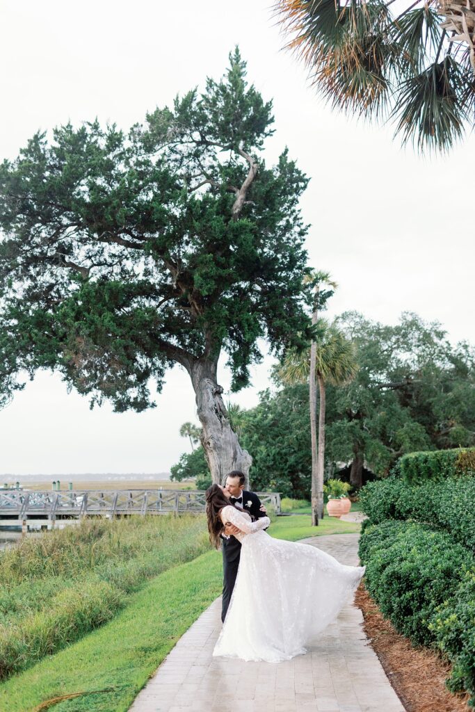 Gorgeous couple kissing outside after getting married