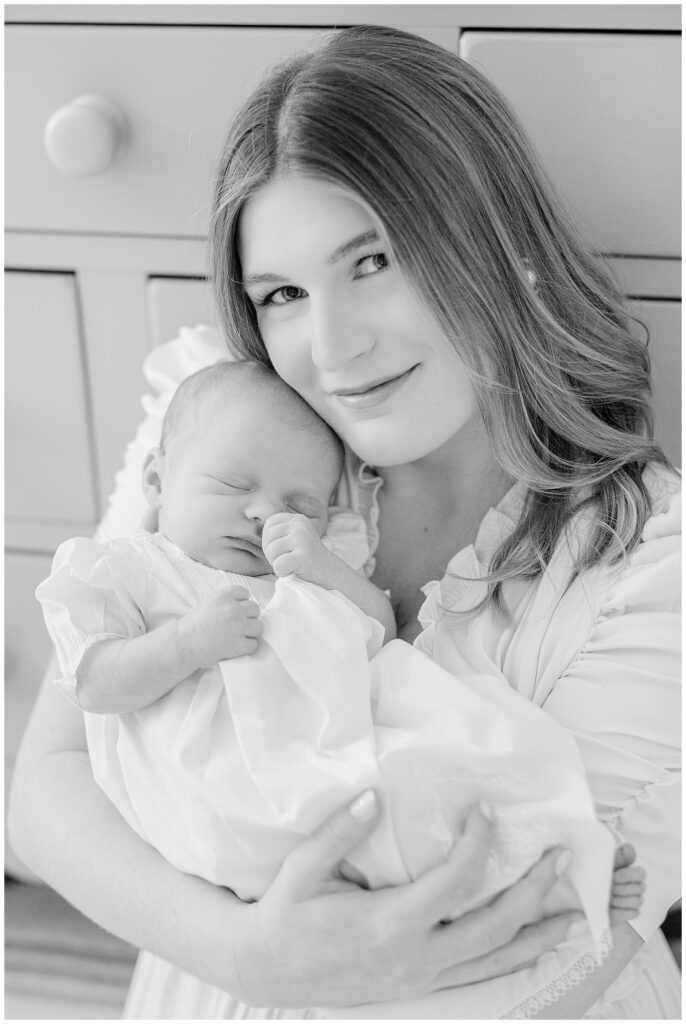 black and white photo of mom and baby captured by a newborn photographer in Athens